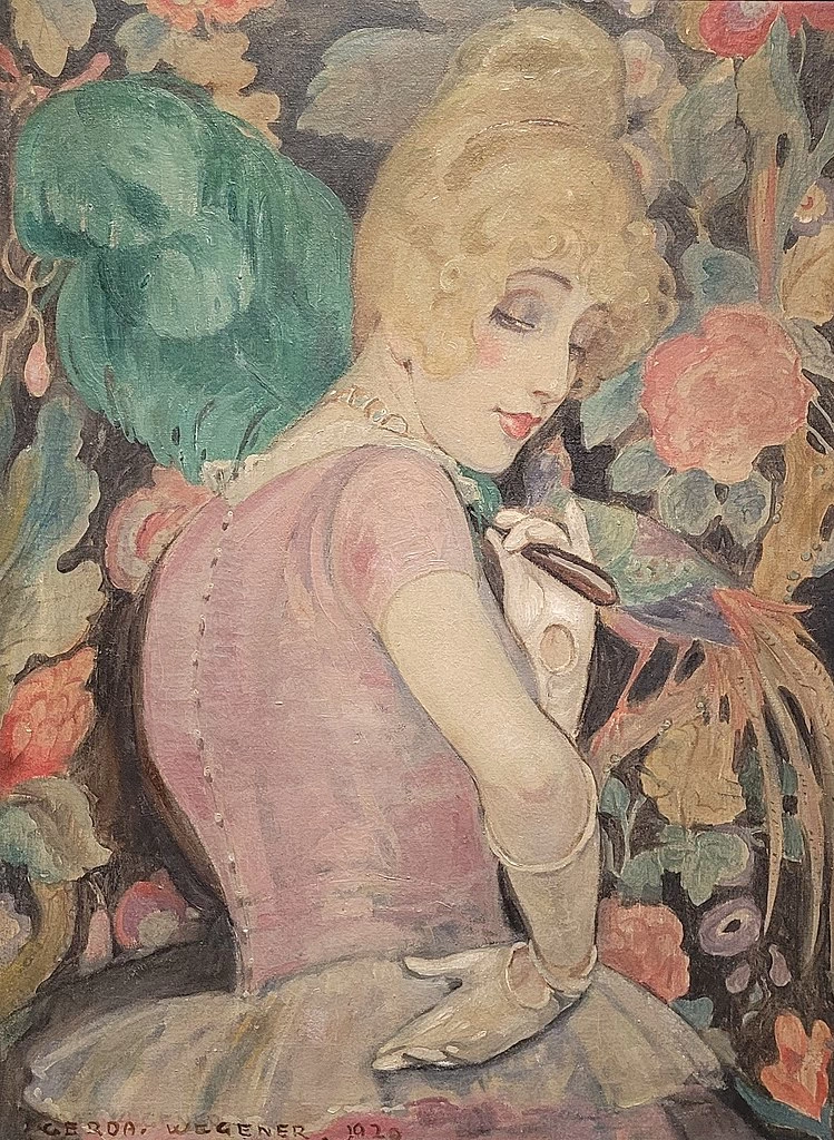 Lili con un ventaglio di piume
